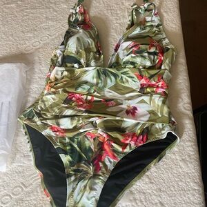 Floral one piece bathing suit. Never worn.
